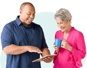 two people looking at a tablet