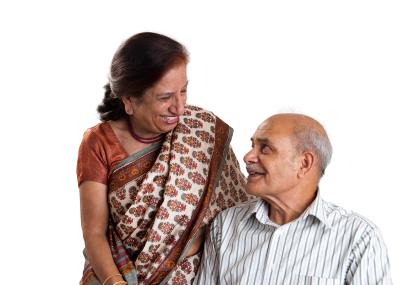 Indian couple smiling at each other